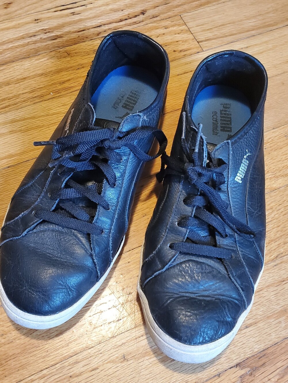 Black Leather Puma Sneakers
